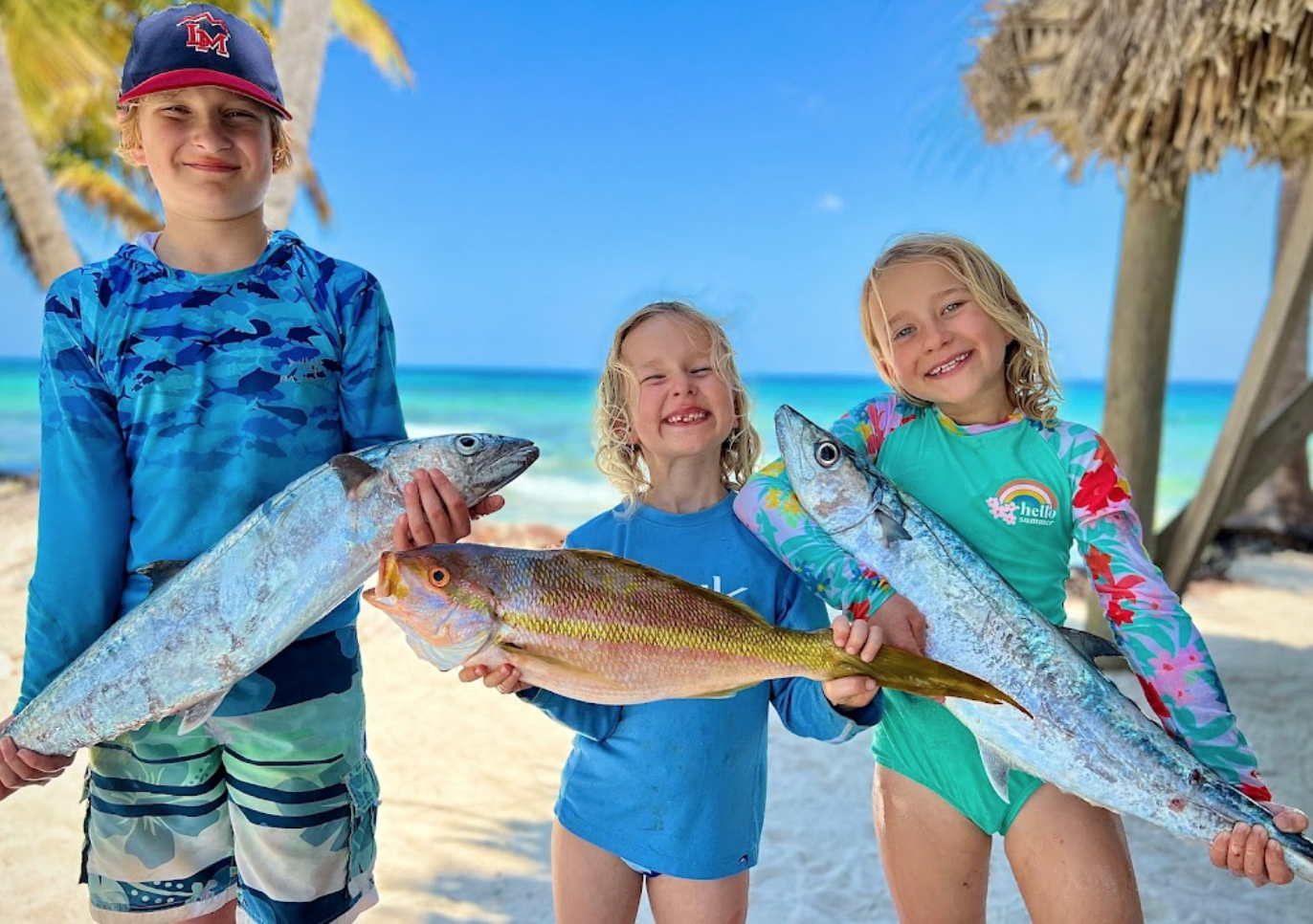 kids fishing placencia family trip